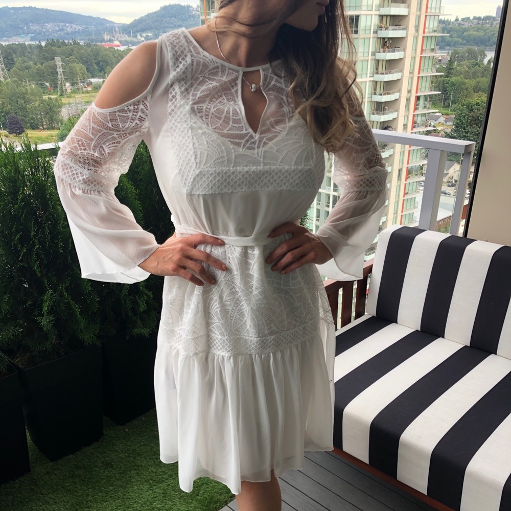 S/4 BCBG white dress, never worn, tags attached.